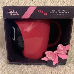 Squid Game character mug, holds 18 ounces.